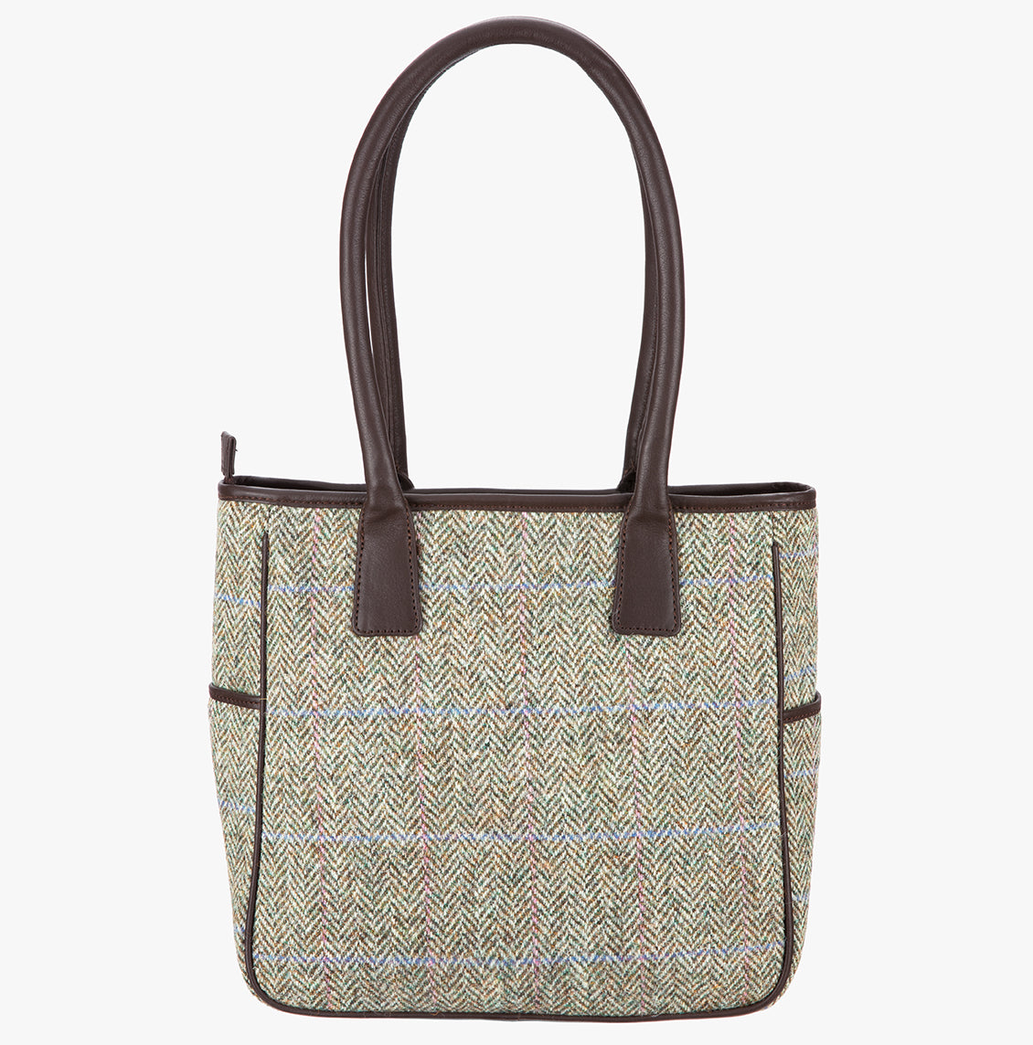 This is the reverse of the Harris Tweed tote bag in pastel check with handles that go over the shoulder. This bag's colour is brown and cream herringbone with a pink and pale blue over check. It has a pocket on each side of the bag trimmed with brown leather.