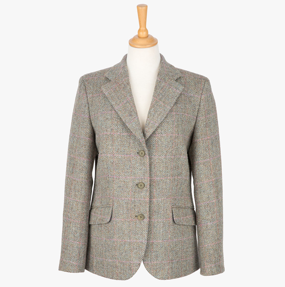 Harris Tweed ladies jacket in pastel check, the colour is a cream and brown small herringbone with a pink and blue overcheck. It has three buttons and two pockets.