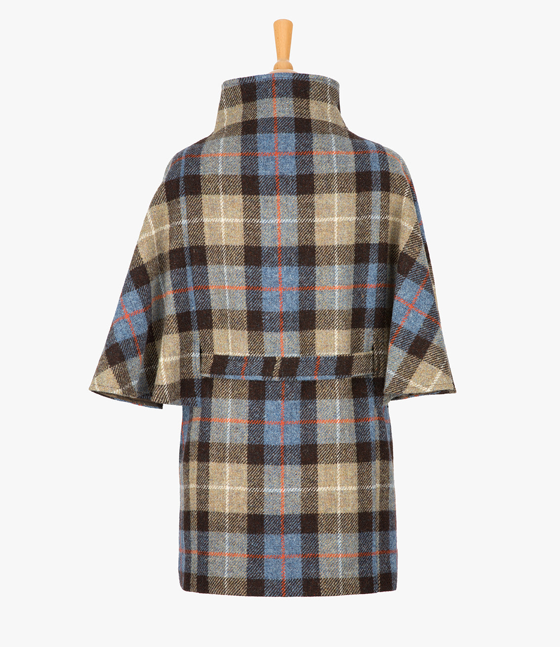 This is the rear view of the belted cape in Camel check, the colour is brown and taupe check, with an orange and white overcheck. You can see the collar stood up and the neat belt at the back.