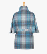 This is the rear view of the belted cape in Lavender, the colour is blue, lilac and grey check, with a purple and red overcheck. You can see the collar stood up and the neat belt at the back.