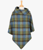Harris Tweed poncho in Denim Sage check, it has a folded over cowl collar with 3 Celtic buttons detail.