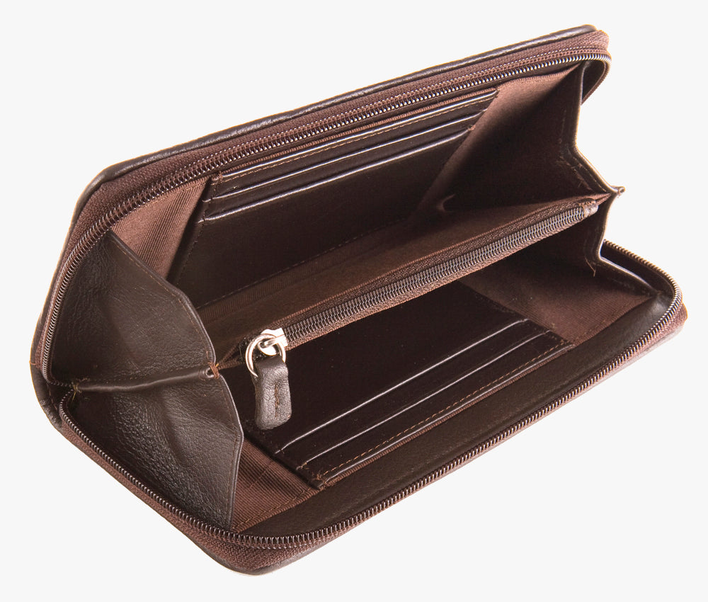 Inside view of Harris Tweed purse in brown leather, it has two pockets to store notes and receipts, two coin compartments, space for six bank cards and a secure zip compartment.