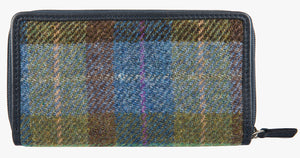 Rear view of Harris Tweed purse in denim sage check with a navy leather trim.  