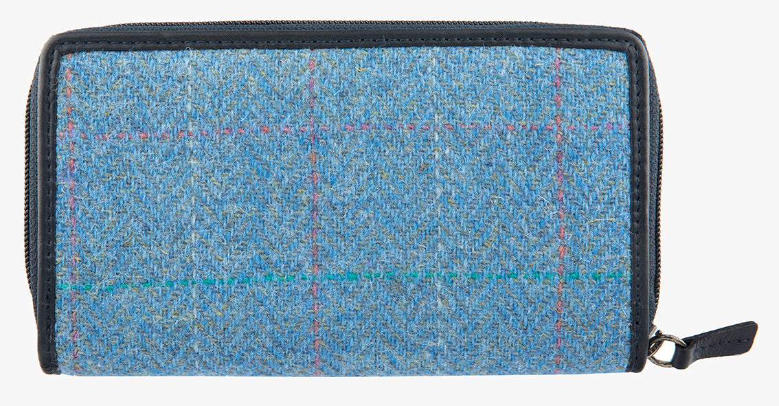 Rear view of Harris Tweed purse in Sky blue with a navy leather trim.  