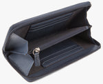 Inside view of Harris Tweed purse in navy leather, it has two pockets to store notes and receipts, two coin compartments, space for six bank cards and a secure zip compartment.