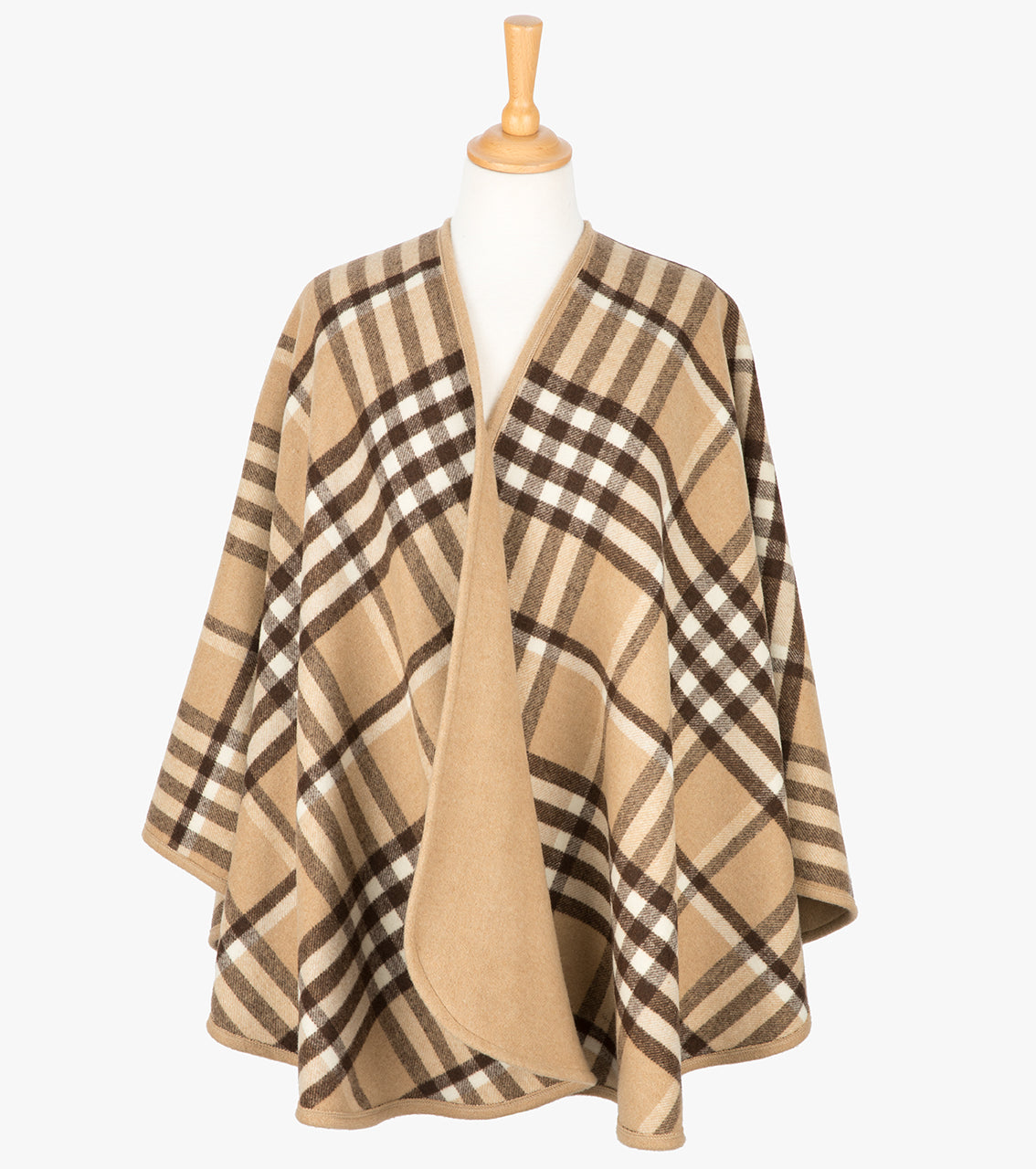 Reversible Wool and Cashmere serape/wrap in camel check it is camel on one side and a brown check on the reverse as shown.