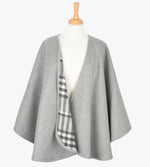 Reversible Wool and Cashmere serape/wrap in grey, it is grey on one side and a grey check on the reverse as shown.