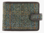 Harris Tweed wallet trimmed in leather in green/blue check.