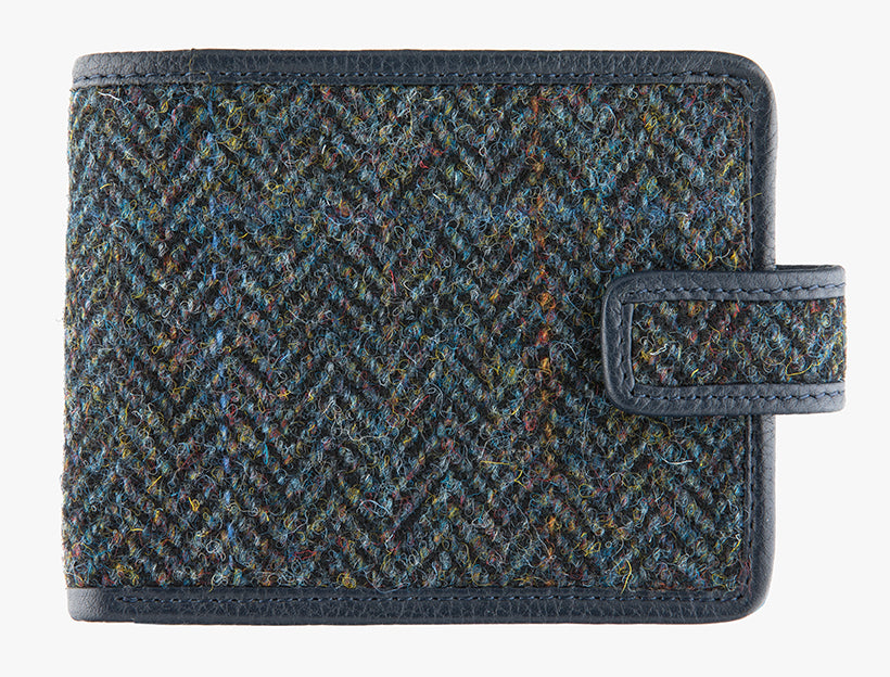 Harris Tweed wallet trimmed in leather in midnight herringbone.