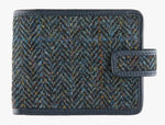 Harris Tweed wallet trimmed in leather in midnight herringbone.