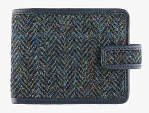 Harris Tweed wallet trimmed in leather in midnight herringbone.