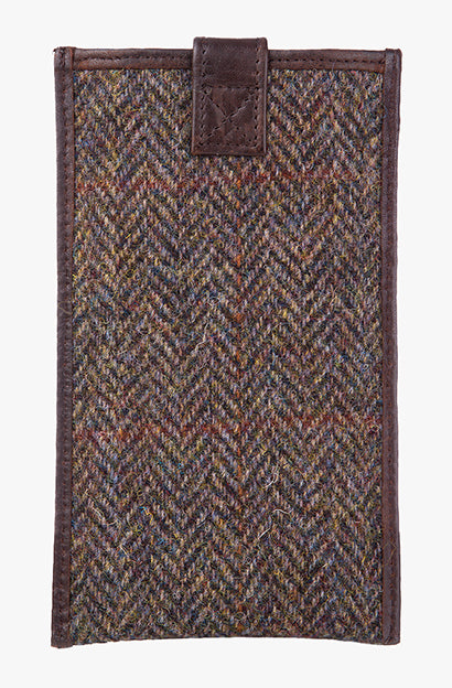 Reverse view of Harris Tweed phone case in brown herringbone trimmed with leather.