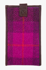 Reverse view of Harris Tweed phone case in cerise check trimmed with leather.
