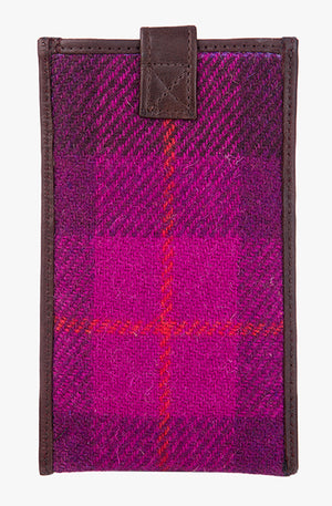 Reverse view of Harris Tweed phone case in cerise check trimmed with leather.