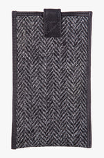 Reverse view of Harris Tweed phone case in charcoal herringbone trimmed with leather.