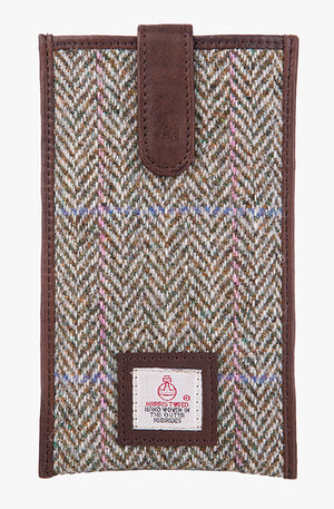 Harris Tweed phone case in pastel check trimmed with leather. This case has a magnetic closing and a small Harris Tweed logo at the bottom of the case.