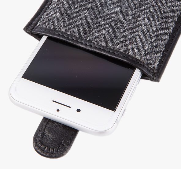 Harris tweed phone case showing a phone placed inside.